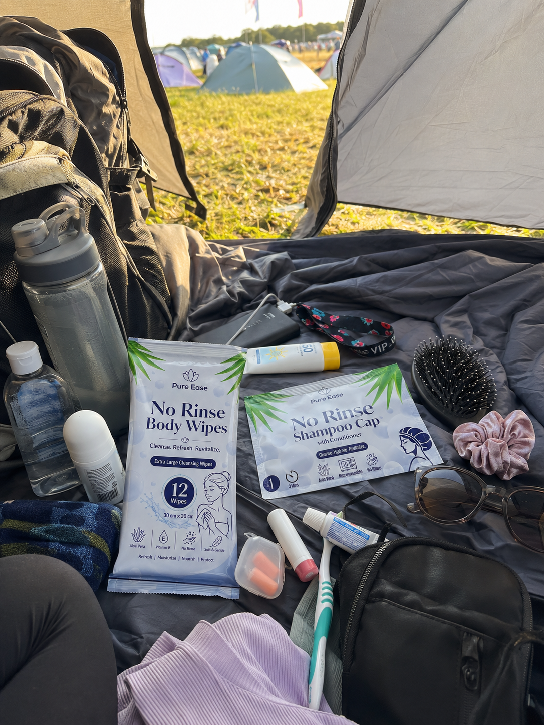 PureEase No Rinse Body Wipes and Shampoo Cap packed with festival essentials